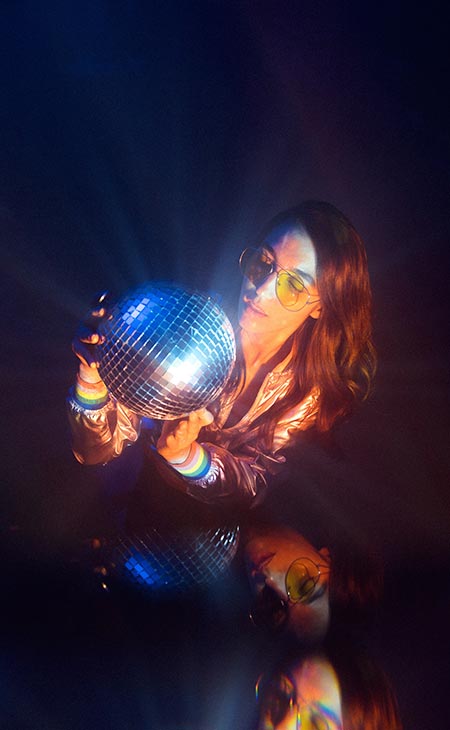 Woman holding disco ball